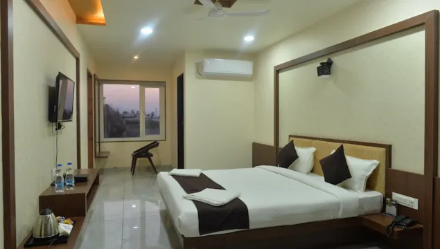 Hotel Sai Inn Room